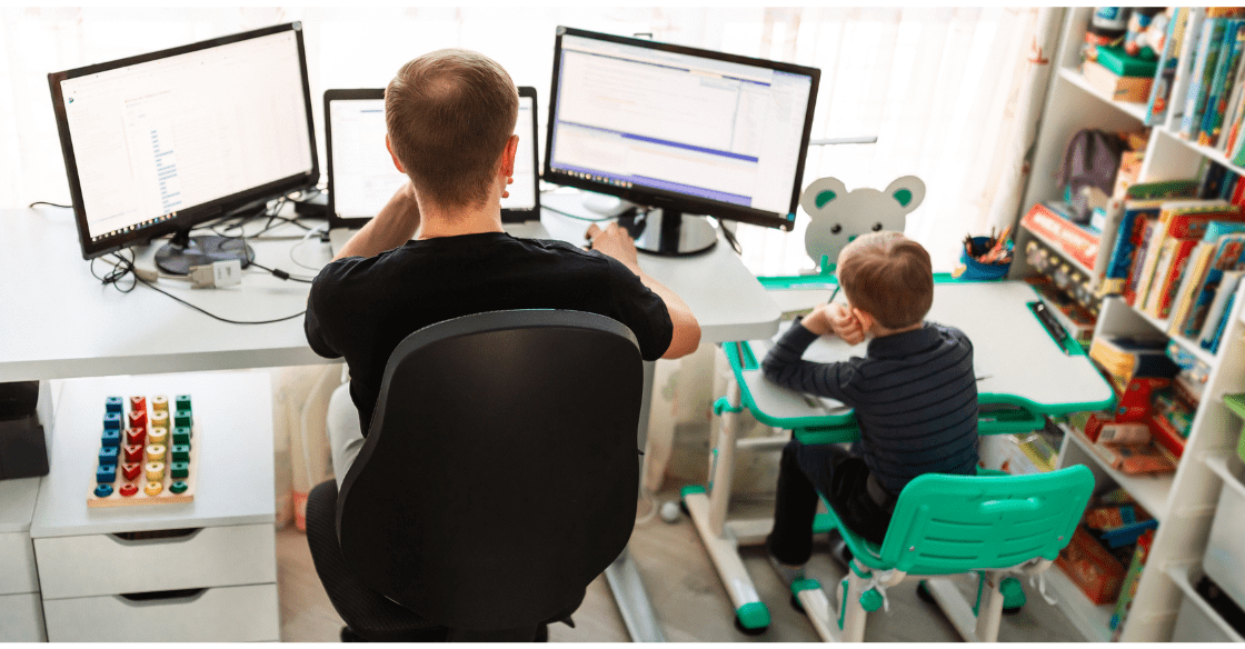 Father and son working from home in a multi-purpose space